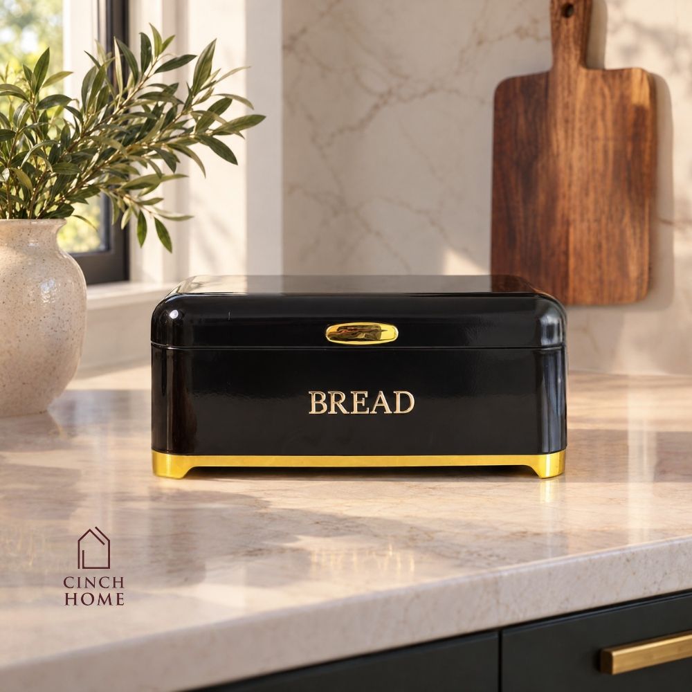 black bread box, bread storage container, bread box with lid, kitchen bread storage, bread bin for kitchen, black bread bin, bread storage box, premium bread box, luxury kitchen accessories, black and gold bread box, kitchen countertop organizer, bread keeper, bakery storage container, bread loaf holder, kitchen storage box, modern kitchen decor, countertop bread bin, food storage container, bread organizer, kitchen organization, housewarming gift, Diwali gift, Cinch Home Copy keywords
