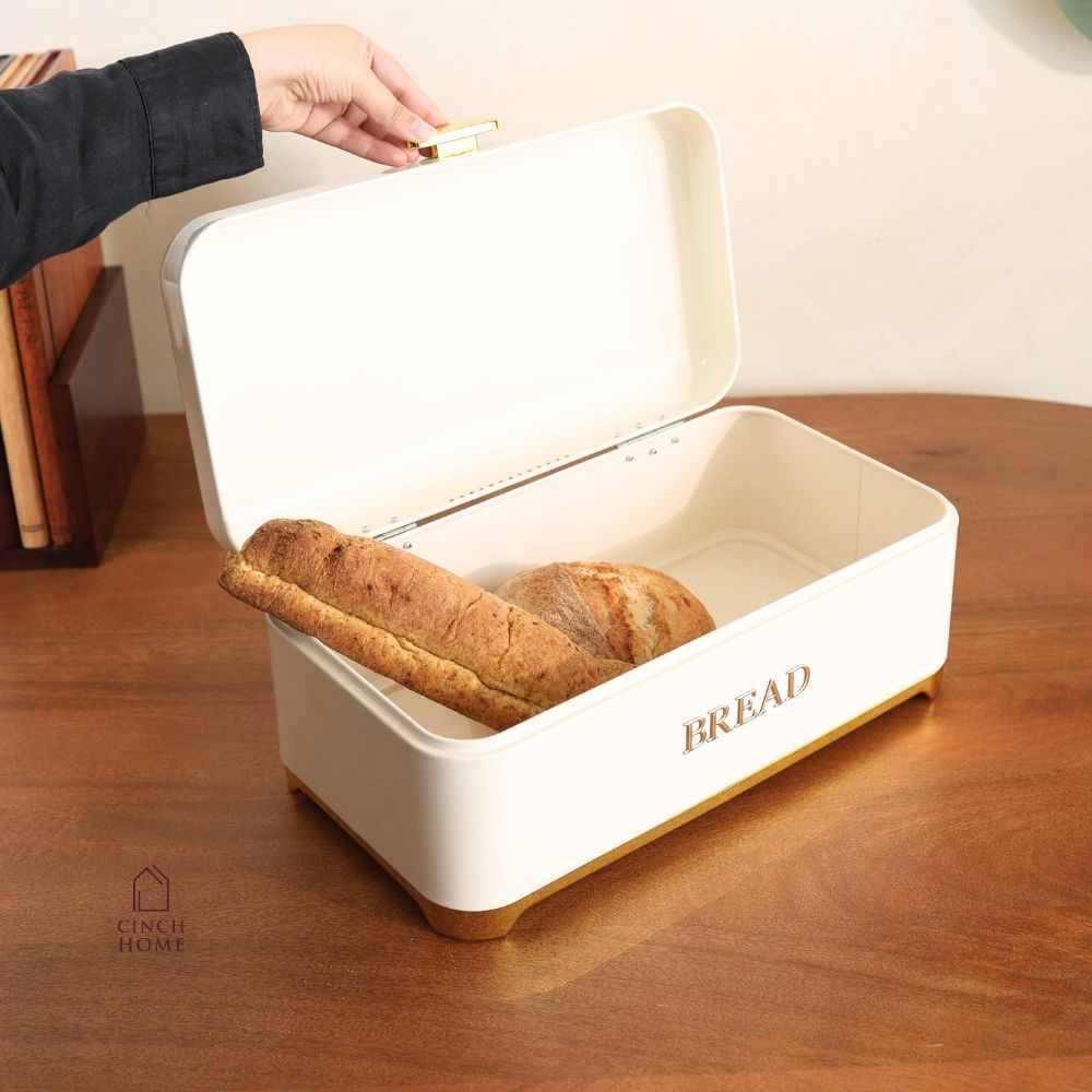 black bread box, bread storage container, bread box with lid, kitchen bread storage, bread bin for kitchen, black bread bin, bread storage box, premium bread box, luxury kitchen accessories, black and gold bread box, kitchen countertop organizer, bread keeper, bakery storage container, bread loaf holder, kitchen storage box, modern kitchen decor, countertop bread bin, food storage container, bread organizer, kitchen organization, housewarming gift, Diwali gift, Cinch Home Copy keywords