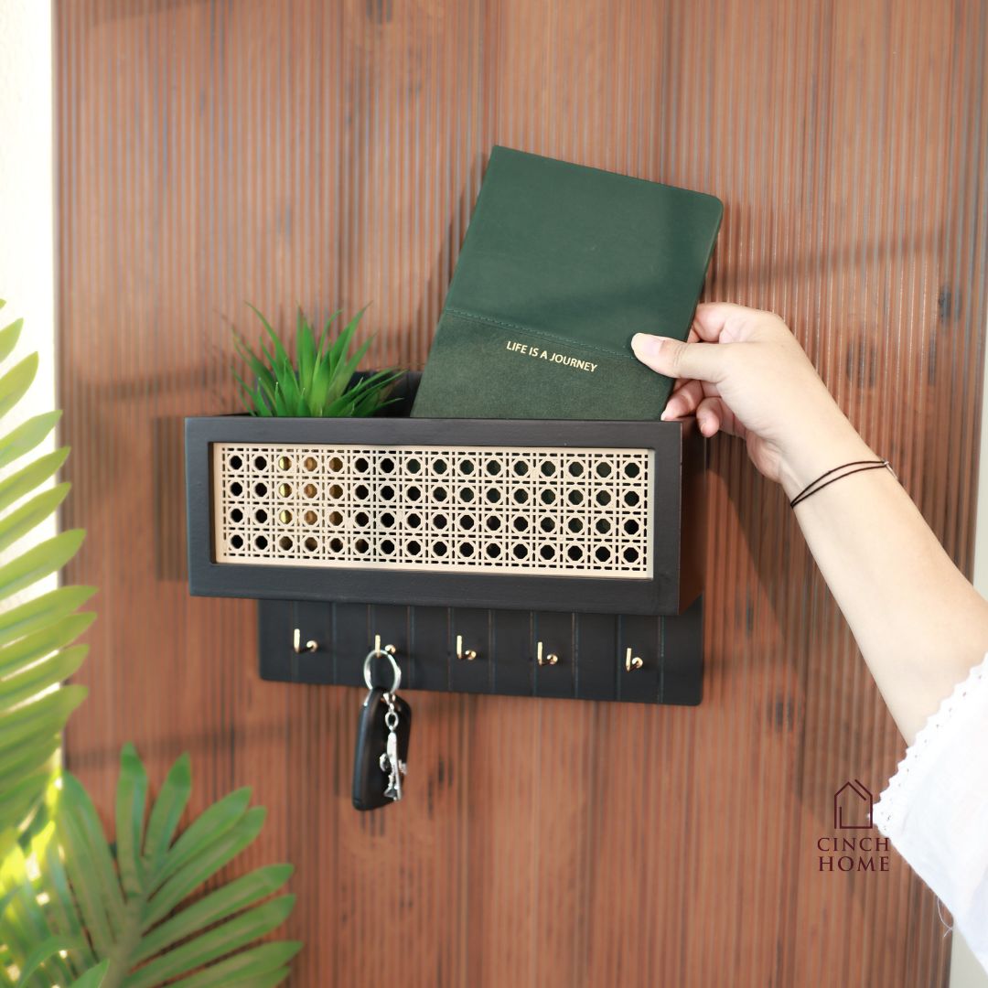 rattan key holder, wall shelf organizer, wooden key hanger, wall mounted key holder, home entryway organizer, black rattan wall décor, wooden key rack India, cane wall shelf, handcrafted key holder, CinchHome organizer