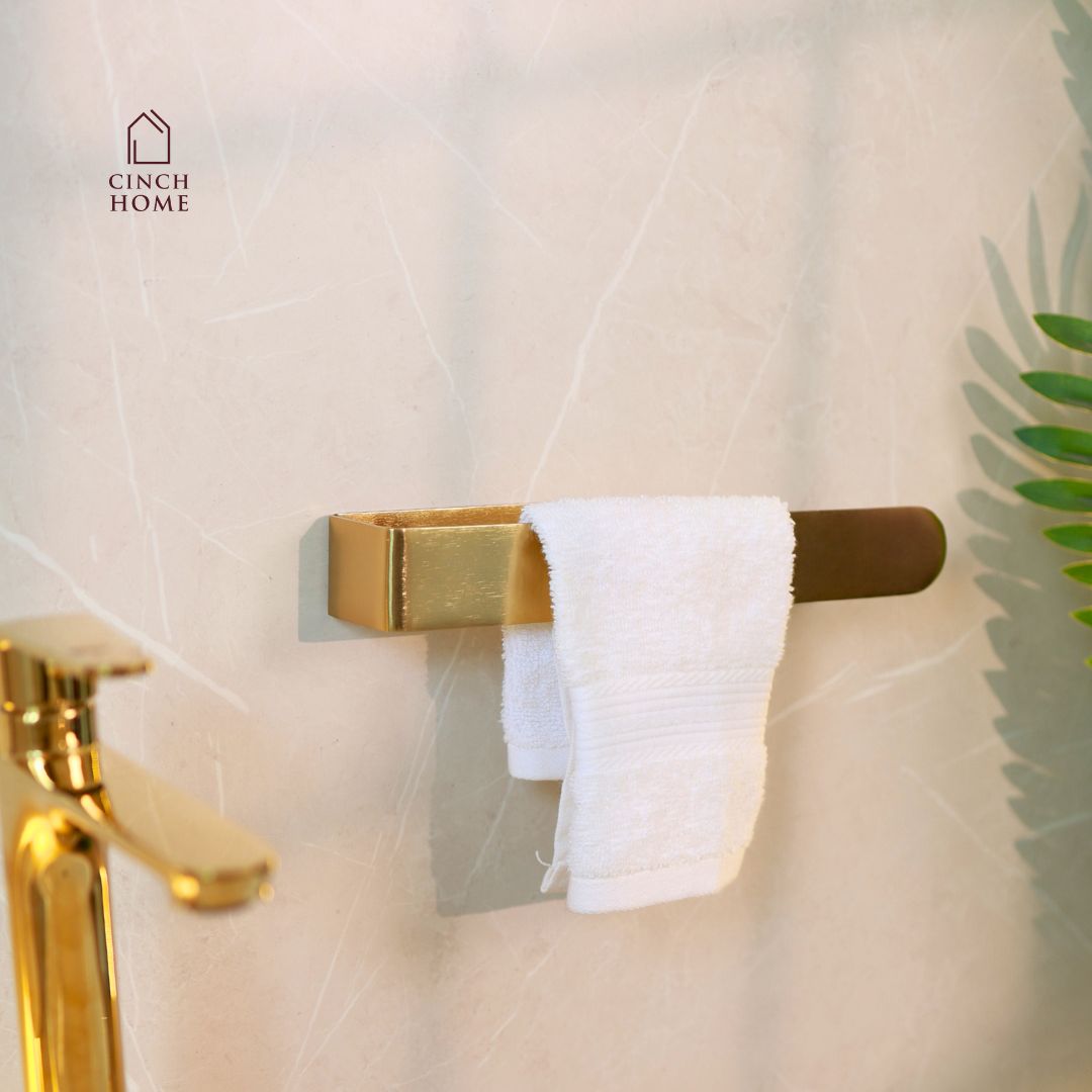 gold towel holder, peel and stick towel rack, self adhesive towel stand, no drill towel holder India, bathroom towel holder, stainless steel gold rack, CinchHome towel holder, wall mounted towel bar, modern bathroom accessories, gold bathroom décor