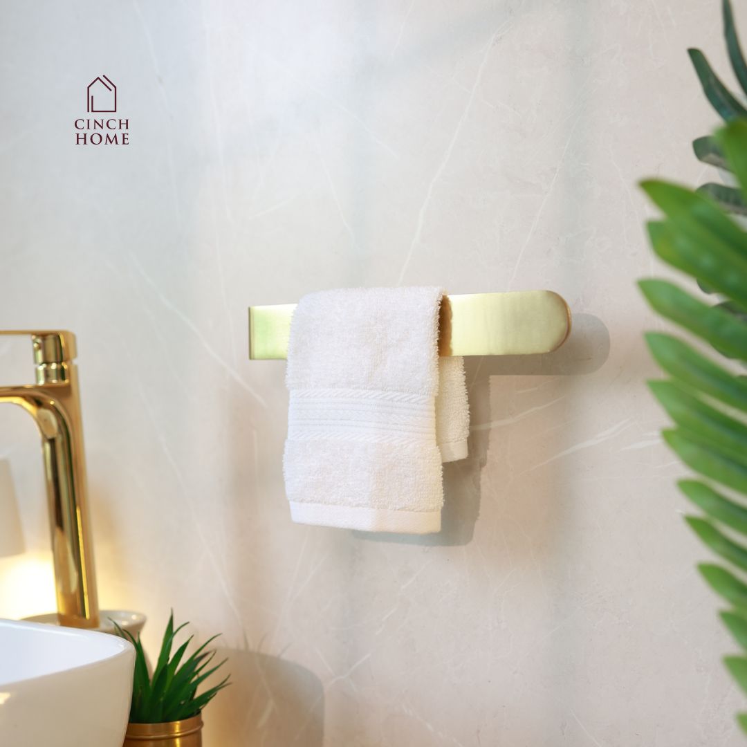 gold towel holder, peel and stick towel rack, self adhesive towel stand, no drill towel holder India, bathroom towel holder, stainless steel gold rack, CinchHome towel holder, wall mounted towel bar, modern bathroom accessories, gold bathroom décor
