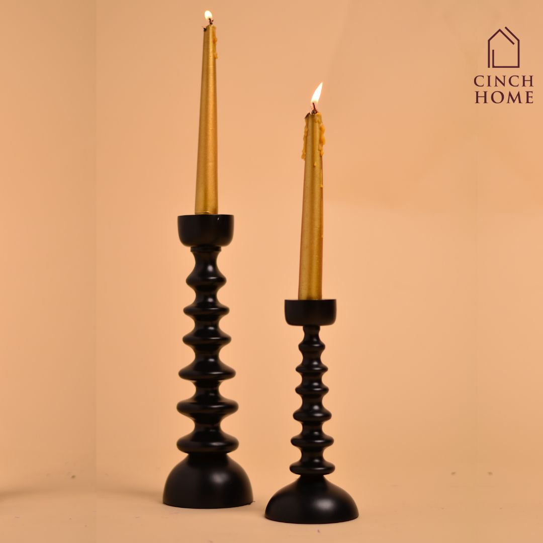 Candle Stands by Cinch Home bring to you metal, glass and wooden Candle Stands. This Diwali, light up your homes with our wide range of exquisite Candle holders at affordable prices. You can also buy scented Pillar Candles of different sizes.