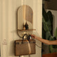 illuminated wall organizer, oval wall organizer, wall key holder, key holder with shelf, key holder with hooks, wall organizer with light, entryway organizer, wall shelf with hooks, ambient wall light, decorative wall shelf, towel hanger, wall mounted organizer, hallway organizer, foyer organizer, bedroom wall organizer, modern wall decor, luxury wall organizer, premium wall decor, wooden wall shelf, key hooks for wall, multifunctional wall organizer, Cinch Home wall organizer