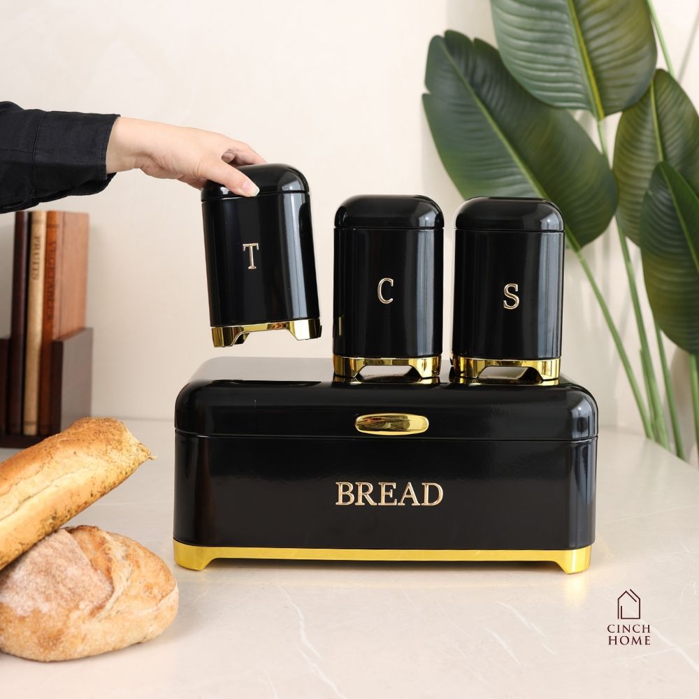 black bread box, bread storage container, bread box with lid, kitchen bread storage, bread bin for kitchen, black bread bin, bread storage box, premium bread box, luxury kitchen accessories, black and gold bread box, kitchen countertop organizer, bread keeper, bakery storage container, bread loaf holder, kitchen storage box, modern kitchen decor, countertop bread bin, food storage container, bread organizer, kitchen organization, housewarming gift, Diwali gift, Cinch Home Copy keywords