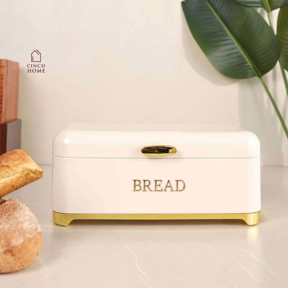 black bread box, bread storage container, bread box with lid, kitchen bread storage, bread bin for kitchen, black bread bin, bread storage box, premium bread box, luxury kitchen accessories, black and gold bread box, kitchen countertop organizer, bread keeper, bakery storage container, bread loaf holder, kitchen storage box, modern kitchen decor, countertop bread bin, food storage container, bread organizer, kitchen organization, housewarming gift, Diwali gift, Cinch Home Copy keywords