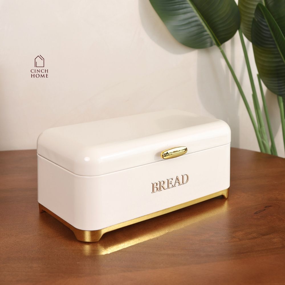 black bread box, bread storage container, bread box with lid, kitchen bread storage, bread bin for kitchen, black bread bin, bread storage box, premium bread box, luxury kitchen accessories, black and gold bread box, kitchen countertop organizer, bread keeper, bakery storage container, bread loaf holder, kitchen storage box, modern kitchen decor, countertop bread bin, food storage container, bread organizer, kitchen organization, housewarming gift, Diwali gift, Cinch Home Copy keywords