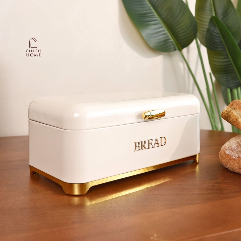 black bread box, bread storage container, bread box with lid, kitchen bread storage, bread bin for kitchen, black bread bin, bread storage box, premium bread box, luxury kitchen accessories, black and gold bread box, kitchen countertop organizer, bread keeper, bakery storage container, bread loaf holder, kitchen storage box, modern kitchen decor, countertop bread bin, food storage container, bread organizer, kitchen organization, housewarming gift, Diwali gift, Cinch Home Copy keywords