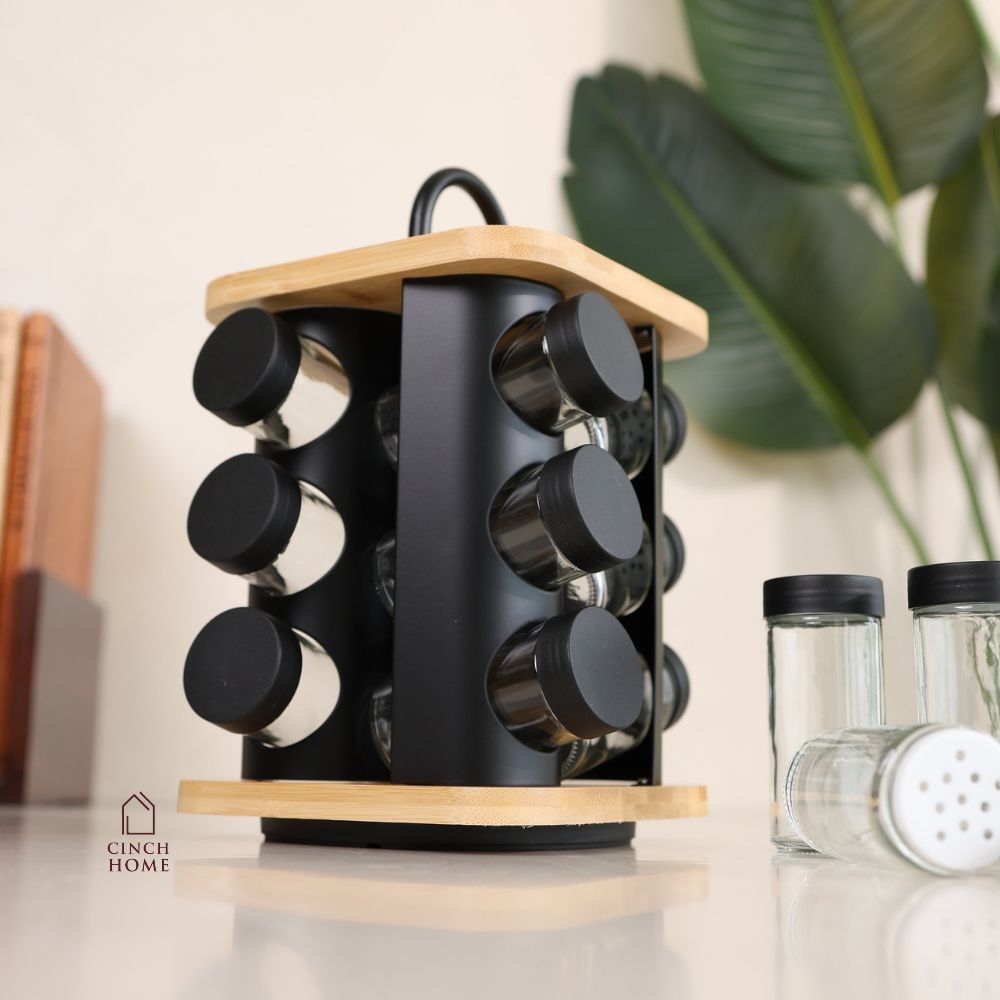 bamboo spice rack, rotating spice rack, spice rack with jars, 12 jar spice rack, glass spice jars, wooden spice rack, rotating masala rack, masala box organizer, kitchen spice organizer, spice jar set, spice storage rack, countertop spice rack, kitchen countertop organizer, stainless steel lid jars, Indian spice rack, masala storage containers, kitchen storage organizer, rotating kitchen organizer, herb and spice jars, pantry organizer, modern kitchen accessories, kitchen organization, Cinch Home Copy keywo
