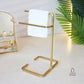 black towel stand for bathroom, modern hand towel holder, countertop towel rack, minimalist towel stand India, matte black towel holder, freestanding towel stand, bathroom accessories modern, small towel stand for sink, powder-coated towel rack, towel organizer for vanity.