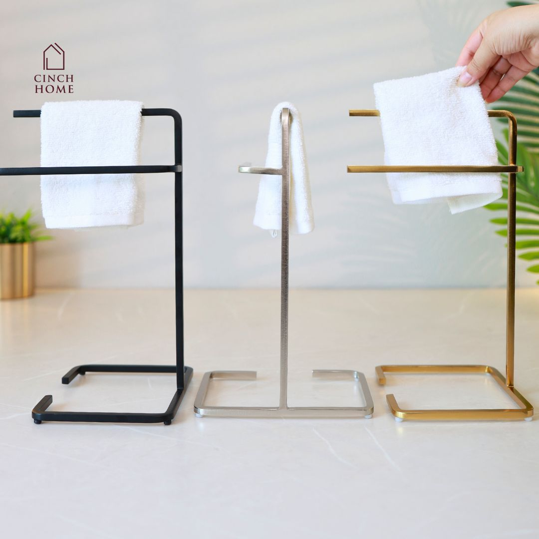 black towel stand for bathroom, modern hand towel holder, countertop towel rack, minimalist towel stand India, matte black towel holder, freestanding towel stand, bathroom accessories modern, small towel stand for sink, powder-coated towel rack, towel organizer for vanity.