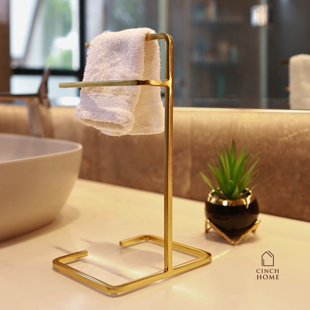 black towel stand for bathroom, modern hand towel holder, countertop towel rack, minimalist towel stand India, matte black towel holder, freestanding towel stand, bathroom accessories modern, small towel stand for sink, powder-coated towel rack, towel organizer for vanity.