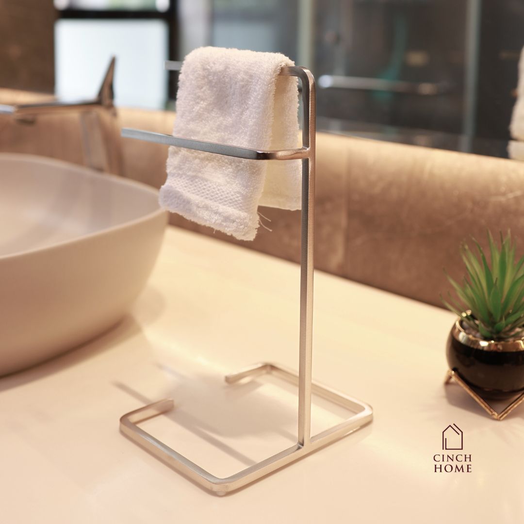 black towel stand for bathroom, modern hand towel holder, countertop towel rack, minimalist towel stand India, matte black towel holder, freestanding towel stand, bathroom accessories modern, small towel stand for sink, powder-coated towel rack, towel organizer for vanity.