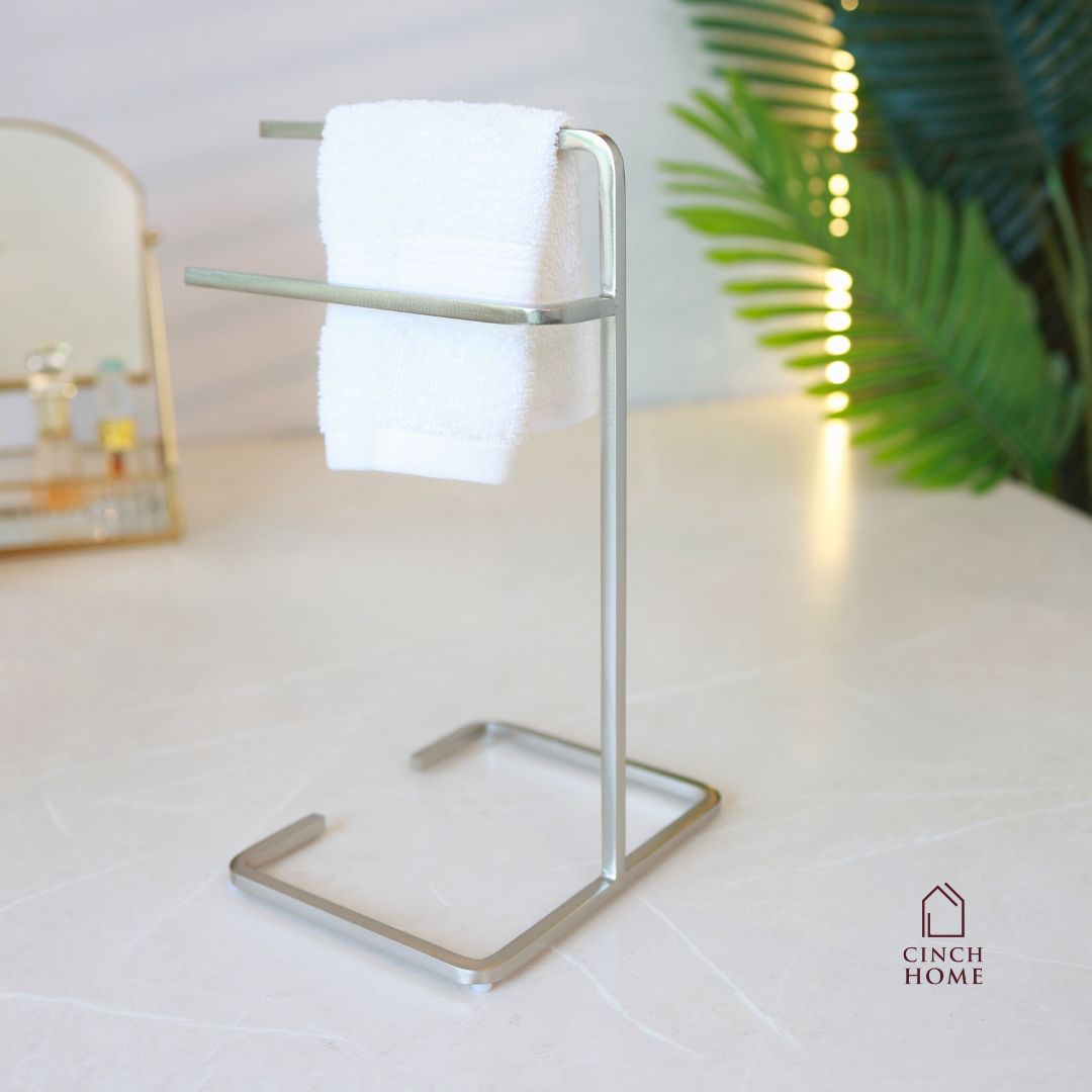 black towel stand for bathroom, modern hand towel holder, countertop towel rack, minimalist towel stand India, matte black towel holder, freestanding towel stand, bathroom accessories modern, small towel stand for sink, powder-coated towel rack, towel organizer for vanity.