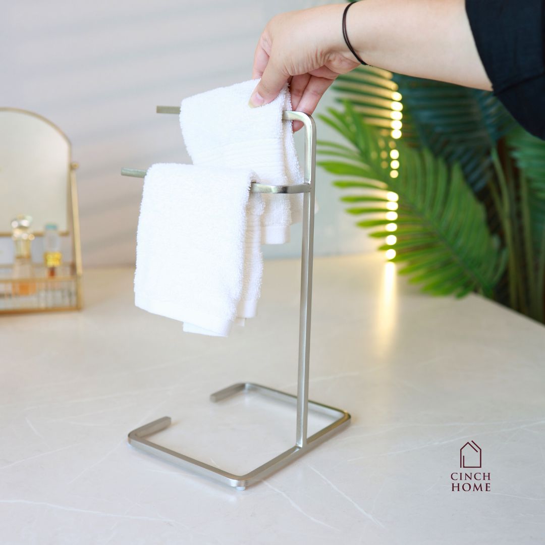 black towel stand for bathroom, modern hand towel holder, countertop towel rack, minimalist towel stand India, matte black towel holder, freestanding towel stand, bathroom accessories modern, small towel stand for sink, powder-coated towel rack, towel organizer for vanity.