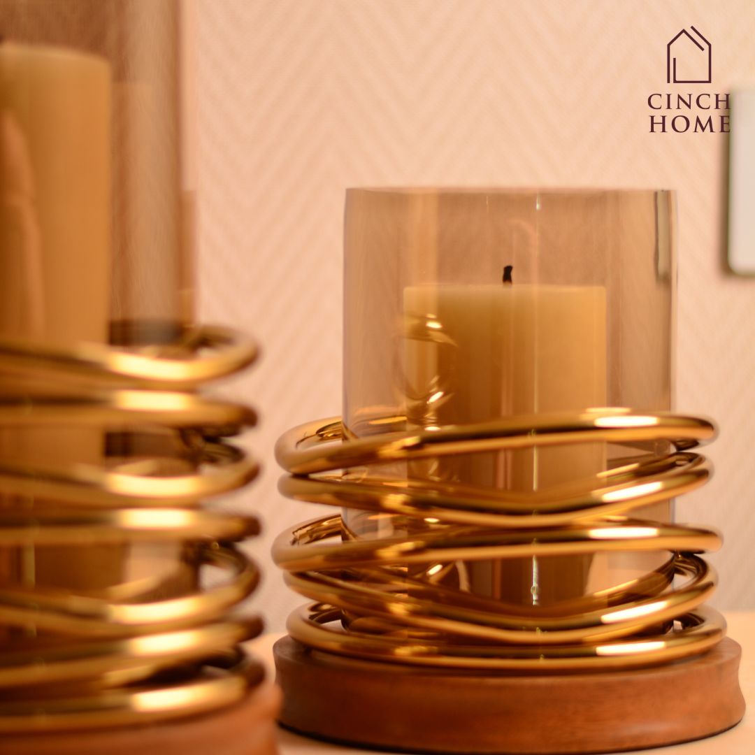 Candle Stands by Cinch Home bring to you metal, glass and wooden Candle Stands. This Diwali, light up your homes with our wide range of exquisite Candle holders at affordable prices. You can also buy scented Pillar Candles of different sizes. 