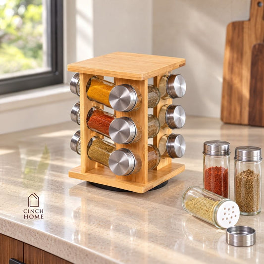bamboo spice rack, rotating spice rack, spice rack with jars, 12 jar spice rack, glass spice jars, wooden spice rack, rotating masala rack, masala box organizer, kitchen spice organizer, spice jar set, spice storage rack, countertop spice rack, kitchen countertop organizer, stainless steel lid jars, Indian spice rack, masala storage containers, kitchen storage organizer, rotating kitchen organizer, herb and spice jars, pantry organizer, modern kitchen accessories, kitchen organization, Cinch Home Copy keywo