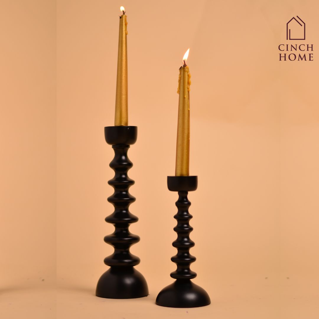 Candle Stands by Cinch Home bring to you metal, glass and wooden Candle Stands. This Diwali, light up your homes with our wide range of exquisite Candle holders at affordable prices. You can also buy scented Pillar Candles of different sizes. 